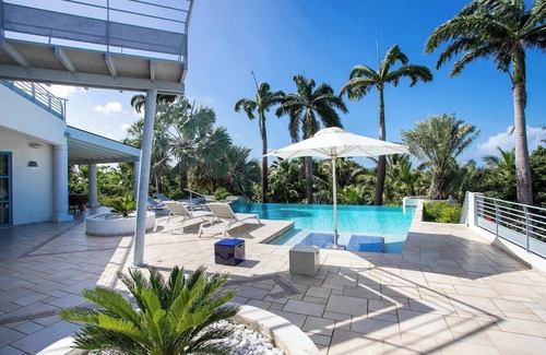 Plum Bay Villa | 5-bedroom villa with heated pool, sauna & tenniscourt within a minute walk from