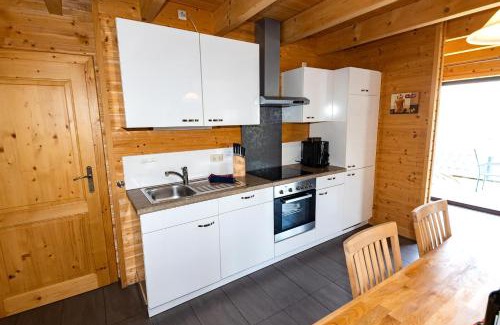 Rieden House | 5 Sterne Ferienhaus Tommy mit Kamin, Seeblick und großer Terrasse