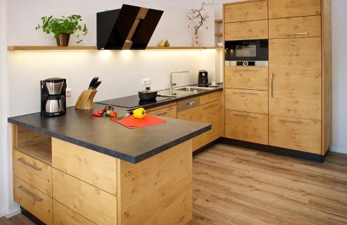 Kalzhofen Apartment | 5 Sterne Ferienwohnung Hochgratblick mit Schwimmbad und Sauna