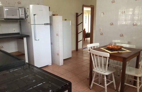 Maresias House | 5 suites near the beach, swimming pool, grass beach tennis court, billiards and wi-fi