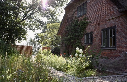 Rodenas House | 5* thatched roof house Ziegelmacher - Vörn 6600sqm natural garden with pond and outdoor sauna