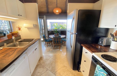 Punaluu Condo | #70 Pog`s Place at Black Sand Beach Punalu`u with Ocean views and Travertine floors.