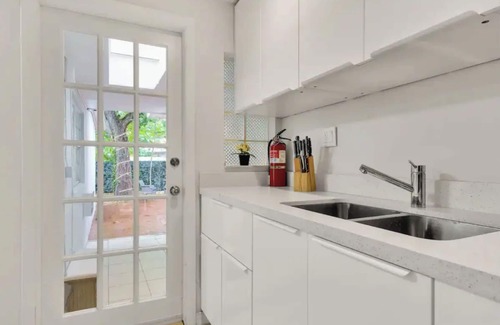Northeast Coconut Grove House | 7BR 5BA Dream: Sleeps 15, Pool, Hot Tub, Wi-Fi, TVs, Gated Parking