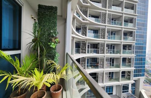 Bonifacio Global City Apartment | 7U Shopping Haven Steps Away from Uptown Mall and Mitsukoshi Mall PAID Parking with Washer