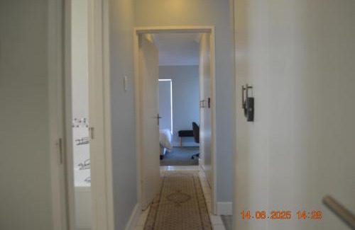 Pollok Beach Apartment | 80 Steps to the Sea