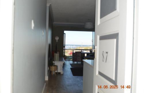 Pollok Beach Apartment | 80 Steps to the Sea