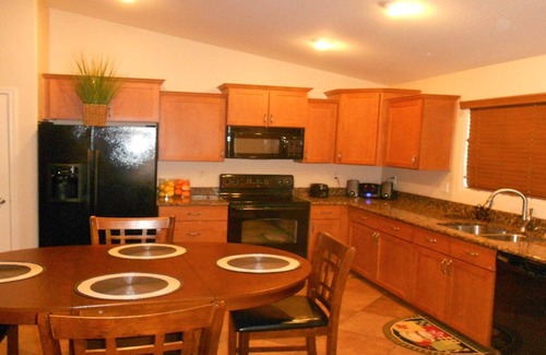 Miller Manor House | 800 SQ FT PUTTING/CHIPPING GREEN NEXT TO HEATED POOL 4 BD RM HOME