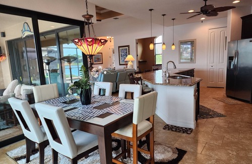 South Gulf Cove House | A 100+ reviews Family friendly home on canal with gulf access and heated pool!