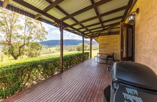 Possum Brush House | A beautiful split level sandstone and cedar cottage.