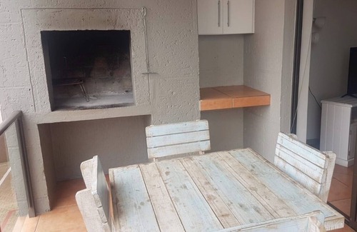 Hartenbos House | A comfortable livingroom, fully equipped kitchen make you feel at home apartment