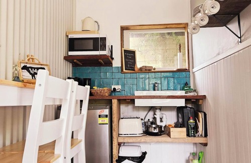 Nungurner House | A converted country barn is set in it's own English country courtyard garden.