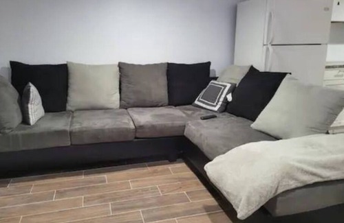 Weequahic Apartment | A cozy basement with queen-size beds Free WiFi, and a Smart TV with Roku.