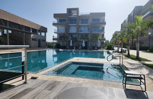 San Pedro de Macoris Apartment | A dreamy vacation apartment, steps from private beach.