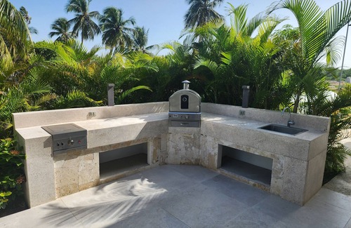 San Pedro de Macoris Apartment | A dreamy vacation apartment, steps from private beach.