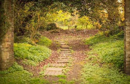 Mountrath House | A gardener's cottage tucked away in the corner of an old country house estate.