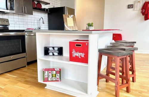Southeast Omaha Apartment | A historic Husker themed, 1,300 square foot loft in the heart of the Old Market