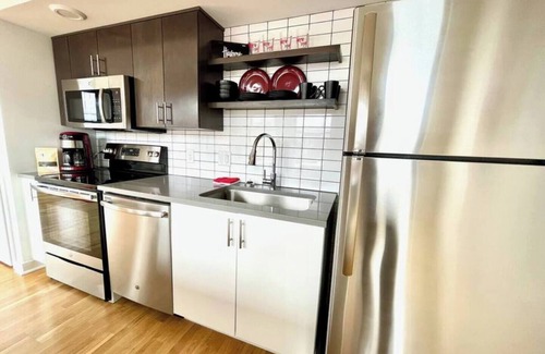 Southeast Omaha Apartment | A historic Husker themed, 1,300 square foot loft in the heart of the Old Market