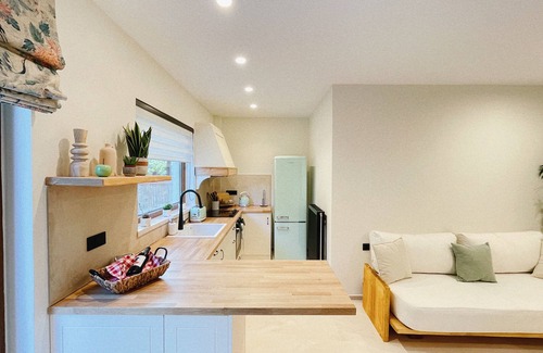 Platanias Town Apartment | A peaceful riverside oasis surrounded by orange and avocado fields