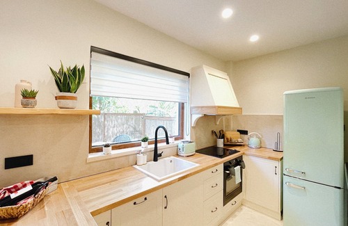 Platanias Town Apartment | A peaceful riverside oasis surrounded by orange and avocado fields