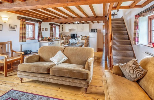Penrith Cottage | A renovated cottage on a working farm with idyllic views of fells.
