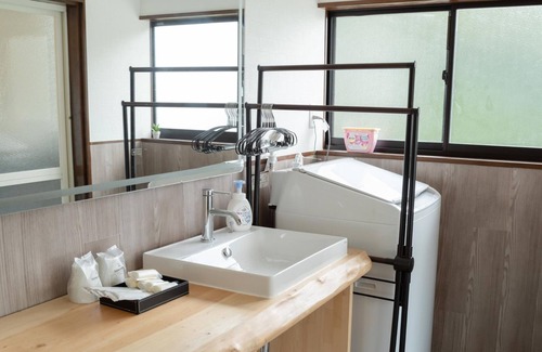 Kamiamakusa House | A rental villa with an orange roof with a BBQ gard /Kamiamakusa Kumamoto