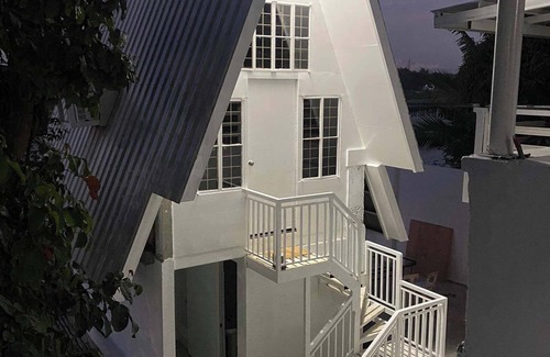 Malolos City House | A slice of paradise with a beautiful river view and infinity pool.