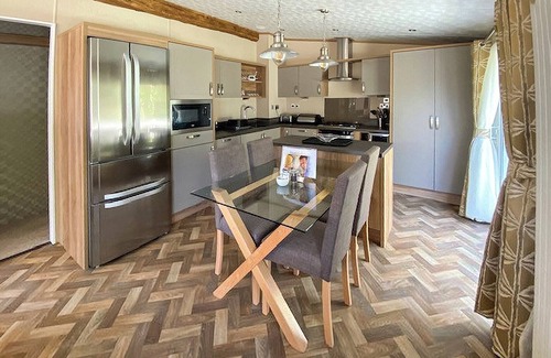 Langham House | A spacious lodge with one master double with en suite shower room.