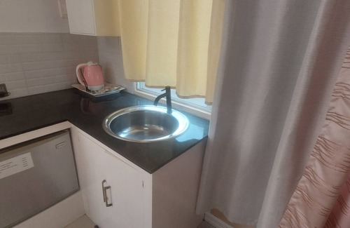 Puerto Princesa Apartment | A touch of pink secret garden resort