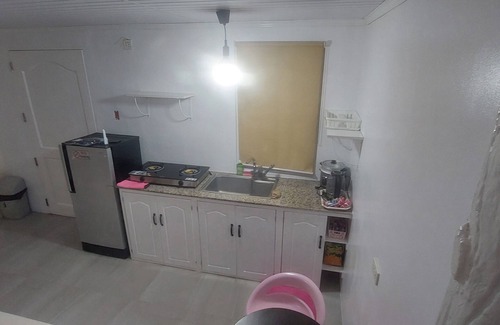 Puerto Princesa Apartment | A touch of pink secret garden resort