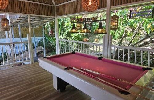 Puerto Princesa Apartment | A Touch of Pink Secret Eco Retreat with Pool, Starlink WiFi, Netflix, Mountain Views - Peaceful Stay in Puerto Princesa Near Underground River, Firefly Watching, and Waterfalls - Perfect Stop Between El Nido, Port Barton, and Puerto City - Scooter Rental