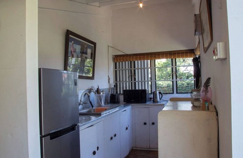 Naivasha House | A unique, eco-friendly hideaway with walls that open to the savannah, allowing safari wildlife viewing from the comfort of the living room.