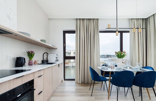 Orlinki Apartment | A unique stay in a modern seaside marina.
