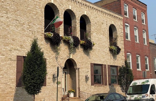 Downtown Baltimore Villa | A Villa Steps from Harbor East with Indoor Pool and 4-Car Parking Sleeps 12