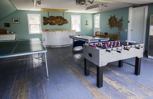 Eastham House | A Wonderful Family Vacation Home with a Huge Deck, game room, and Big Backyard!