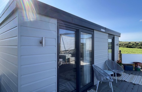 Abersoch Apartment | Abersoch studio with a decking area with amazing views.