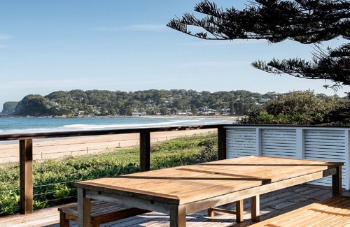 North Avoca House | Absolute beachfront home with log fire