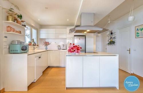 Rovagny House | Acmé - villa with panoramic lake view.