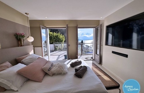 Rovagny House | Acmé - villa with panoramic lake view.