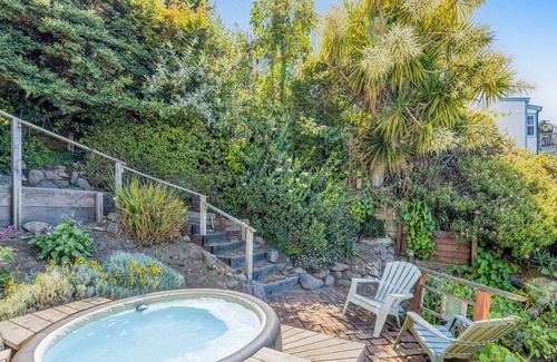 Old Town Cottage | Adorable waterfront cottage with private hot tub, deck, & wood stove