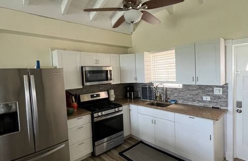Estate Kings Quarter Apartment | Affordable Solar powered 2-Bedroom Haven with Washer/Dryer, near Red Hook!