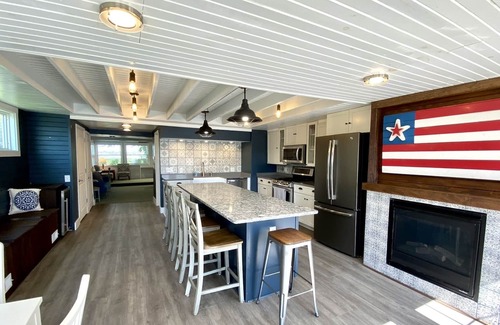 Manitou Beach-Devils Lake House | Airy, updated family cottage on all-sports lake