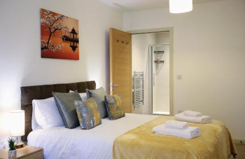 Brent Apartment | Aisiki Stays Apartments at Queensbury, Ground Floor, 2-Bedroom and 2-Bathroom, King or Twin Beds with Front Porch, with Free Wi-Fi & Parking Space