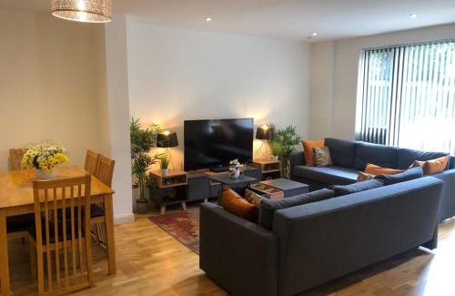 Brent Apartment | Aisiki Stays Apartments at Queensbury, Ground Floor, 2-Bedroom and 2-Bathroom, King or Twin Beds with Front Porch, with Free Wi-Fi & Parking Space