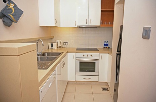 Al Raha Beach Apartment | Al Rahbah 1B 207 · Modern 2BR Apartment - Beach Access