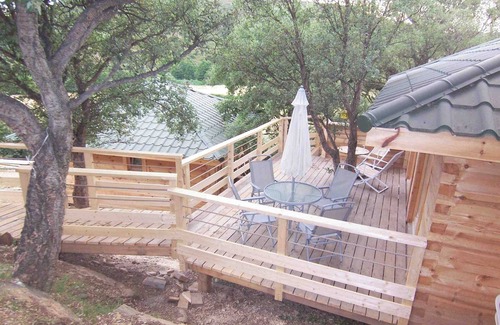 Oletta Apartment | Albaria Lodge, pavilions nestled in the trees, quiet, with terrace 4pers