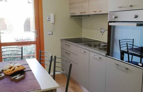 Pivarada Apartment | Alghero: Casa del Sole: Trivano Fronte Spiaggia Lido S. Giovanni con Giardinetto