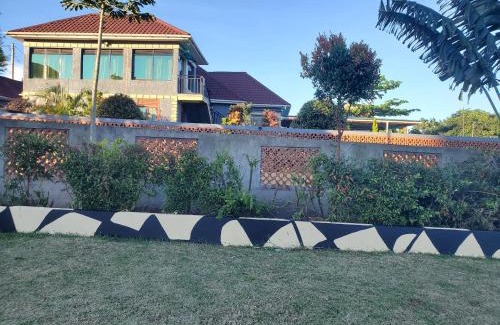 Entebbe Other | Alice Gardens & Campsite
