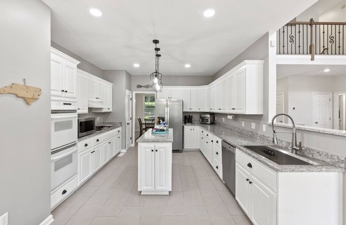 Westport House | All Decked Out by SoCharm | Built in hot tub w/expansive outdoor living