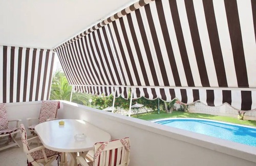 Cabo de las Huertas Apartment | Amazing Apartment at the beach with parking, swimming pool and tram