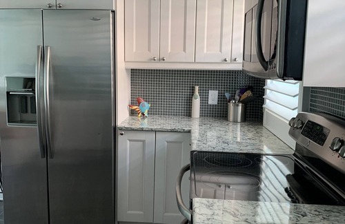 St. Pete Beach Condo | Amazing beach condo with coastal vibes - beachside/poolside - 2 BR/Ground floor!